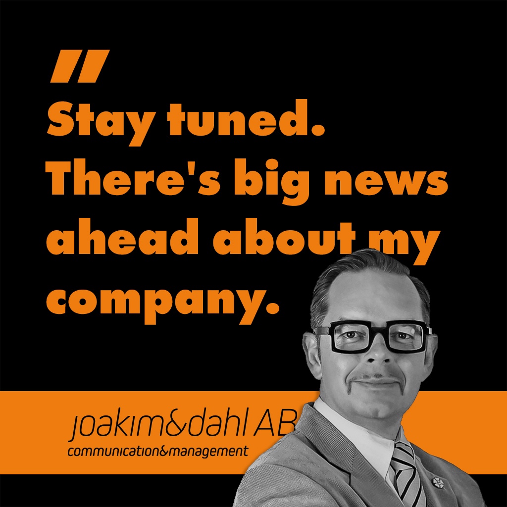 Man wearing glasses and a suit with a confident expression, accompanied by a quote about upcoming company news.