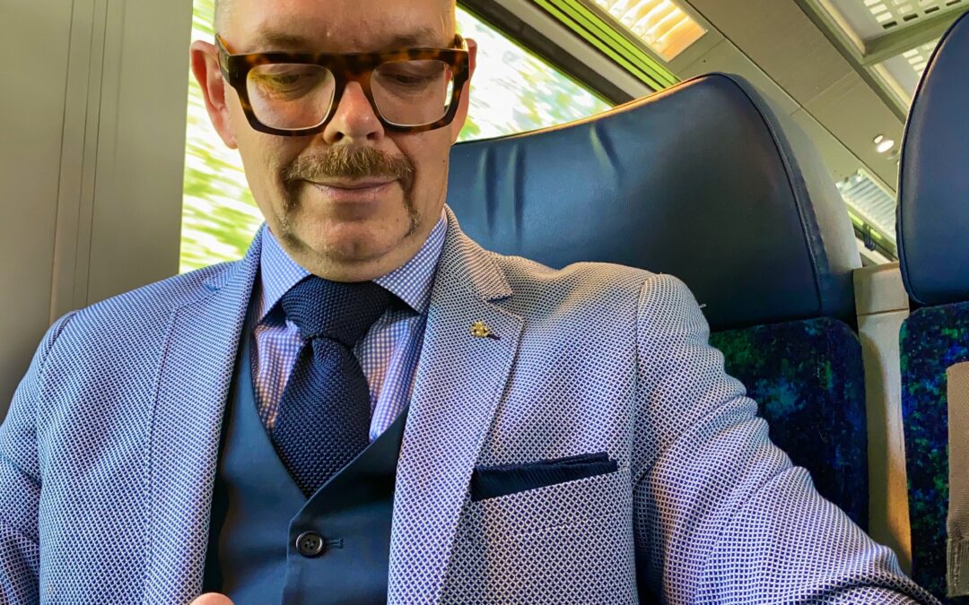 Embarking on European Train Journey: Professional Actor Showcases Business Acumen at Corporate Meeting