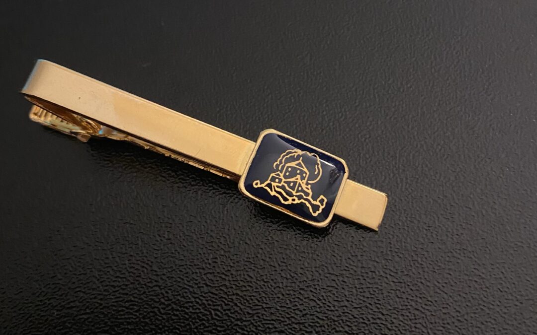 Marking My Induction into the Society of Bankers with a Commemorative Tie Clip