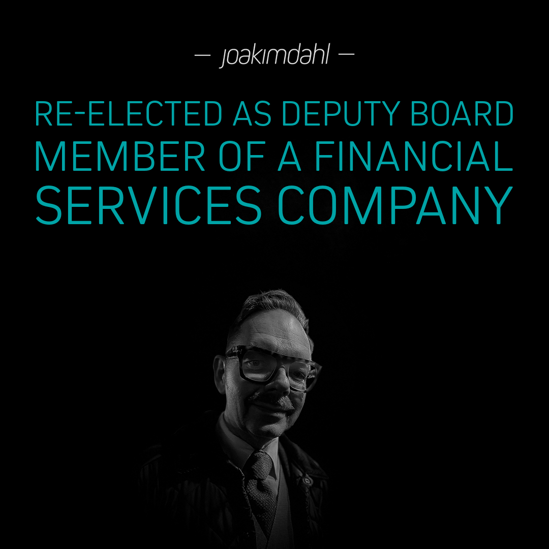 Man wearing glasses and a suit, with text stating 'Re-elected as Deputy Board Member of a Financial Services Company'.